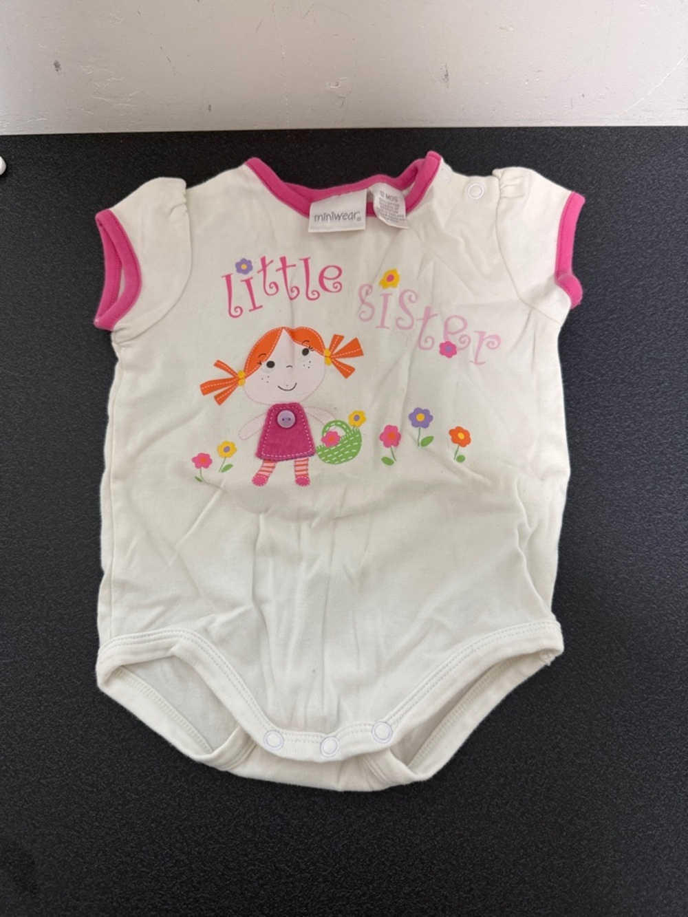 miniwear Cream Onesie with Pink Trim and Colorful Floral Graphic Y2K